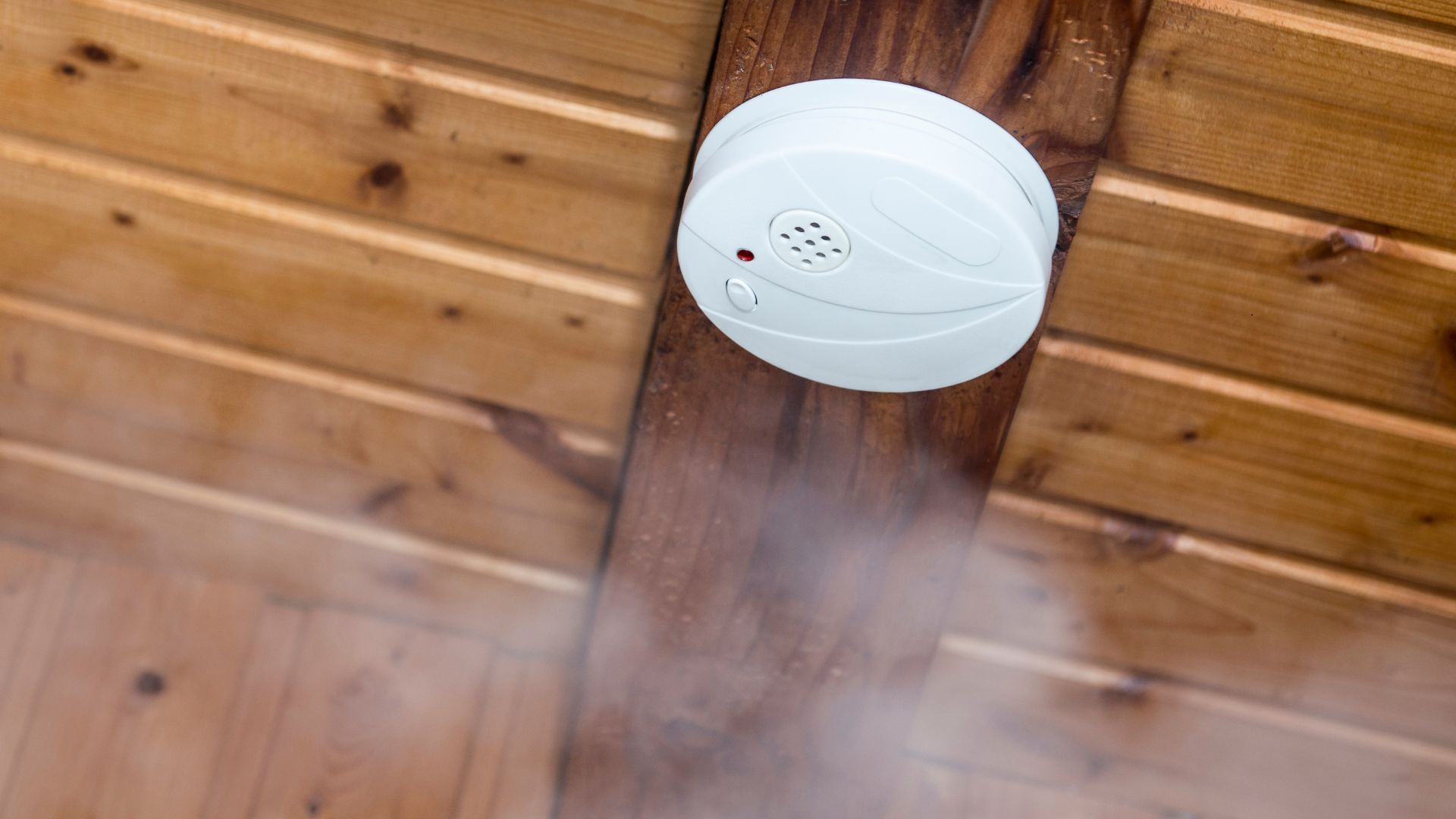 smoke alarm on a wooden roof